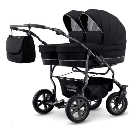 Carrito doble 3 en 1. Incluye capazos, sillas, sillas de coche y accesorios. Apto desde el nacimiento hasta los 3 años. Modelo Duet tipo tandem BBtwin en color negro y plateado.